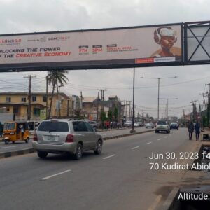 Gantry Print Billboard Along Kudirat Abiola Way By Alausa Busstop Facing Traffic To /And From I Allen, Alausa Ikeja Obafemi Awolowo Way,ojota, Oregun And Opebilink Bridge, Lagos