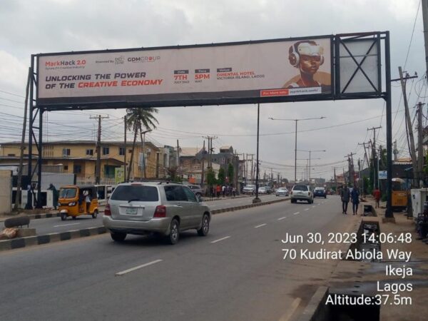 Gantry Print Billboard Along Kudirat Abiola Way By Alausa Busstop Facing Traffic To /And From I Allen, Alausa Ikeja Obafemi Awolowo Way,ojota, Oregun And Opebilink Bridge, Lagos