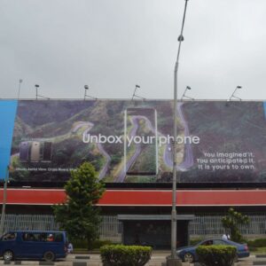 A Large Format Wall Drape Billboard capturing attention in the hustling city of lagos