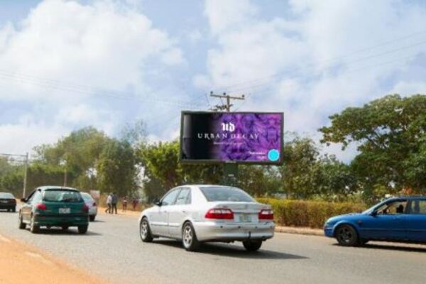 backlit billboard lighting up the city of abuja