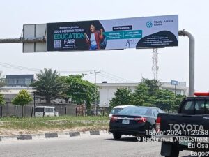 Gantry billboard at 9 Baderinwa Alabi Street, Eti Osa, Lagos, Nigeria