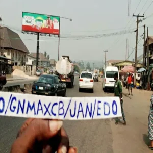 A unipole billboard standing tall in the city of benin