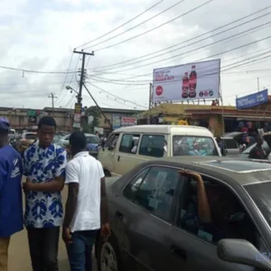 A rooftop billboard capturing attention in Benin city