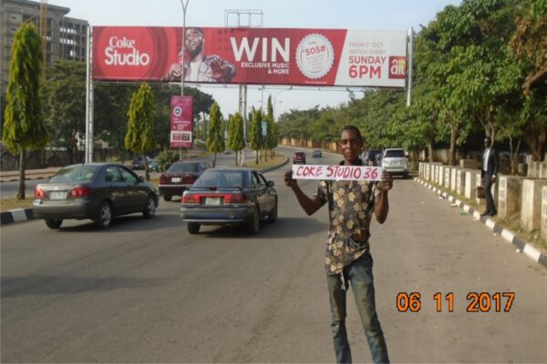 Gantry billboard capturing attention of passersby in Abuja