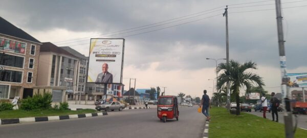 portrait billboard in the busy city of Awka ibom