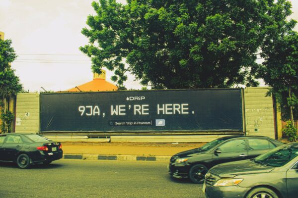 Wall drape billboard advertising at Allen Ikeja, Lagos Nigeria